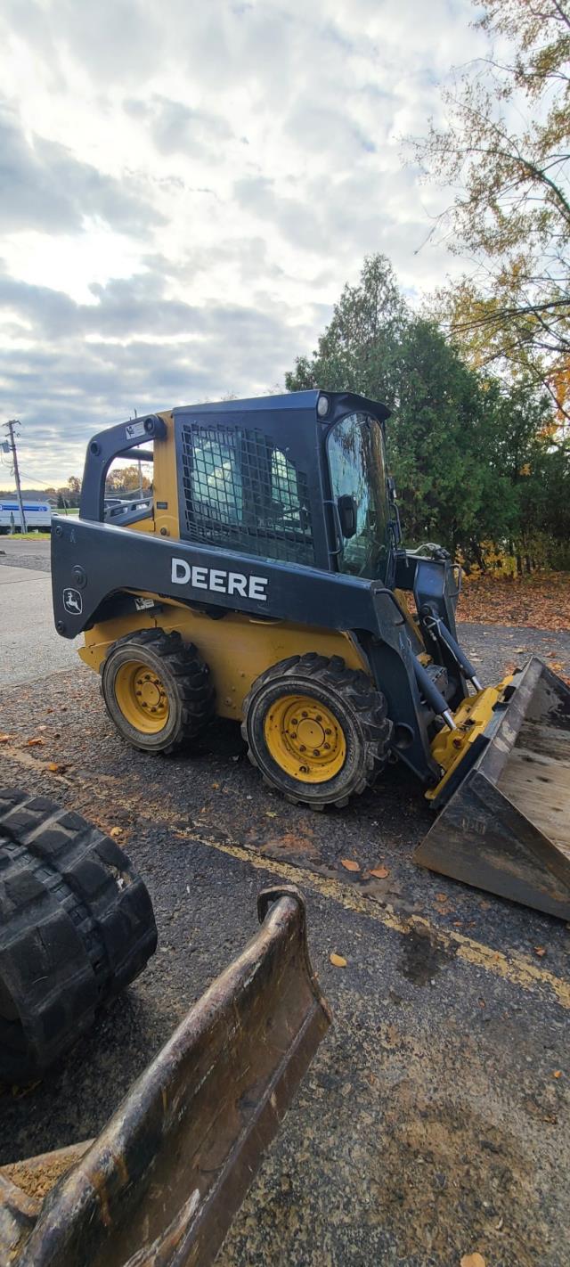 Used equipment sales loader over tire track jd 318 in Tri-County Area